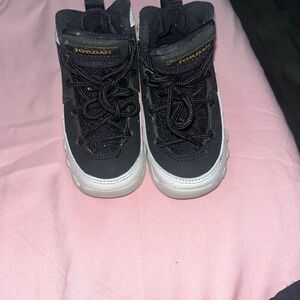 Jordan Kids Black and White High-Top Sneakers with Gold Logo